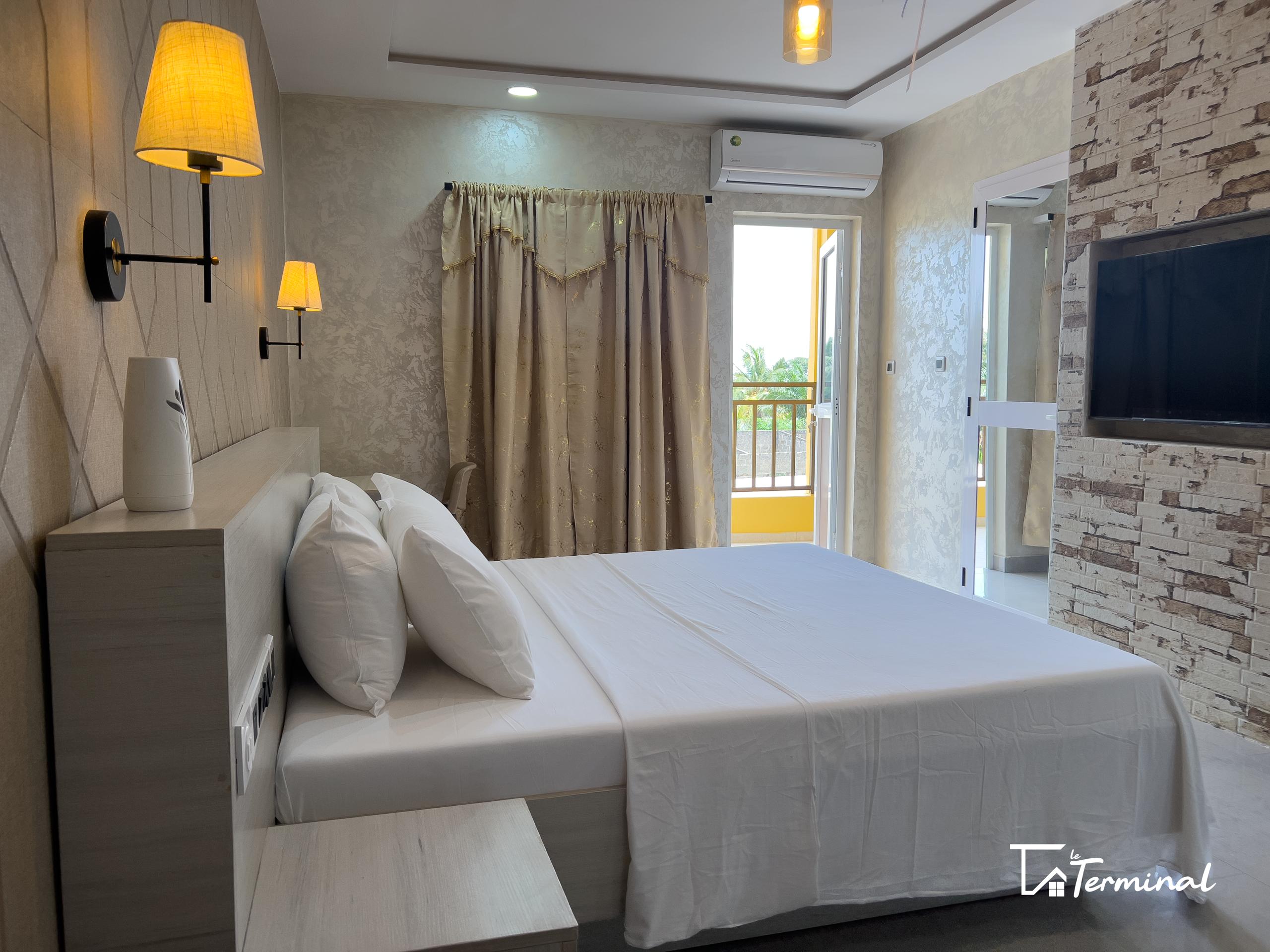 Chambre climatisée à l’Hôtel Le Terminal à Agbodrafo
